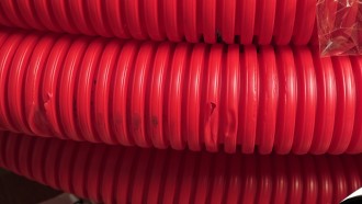 Труба гофрированная двустенная ПНД d=63мм красная (50м) IEK. Уценка.